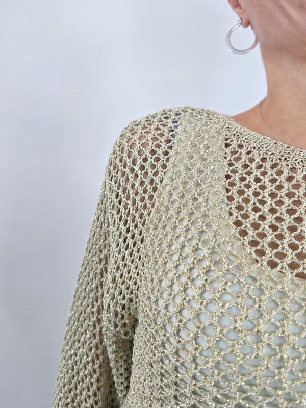 Kontatto maglia gialla a rete indossata