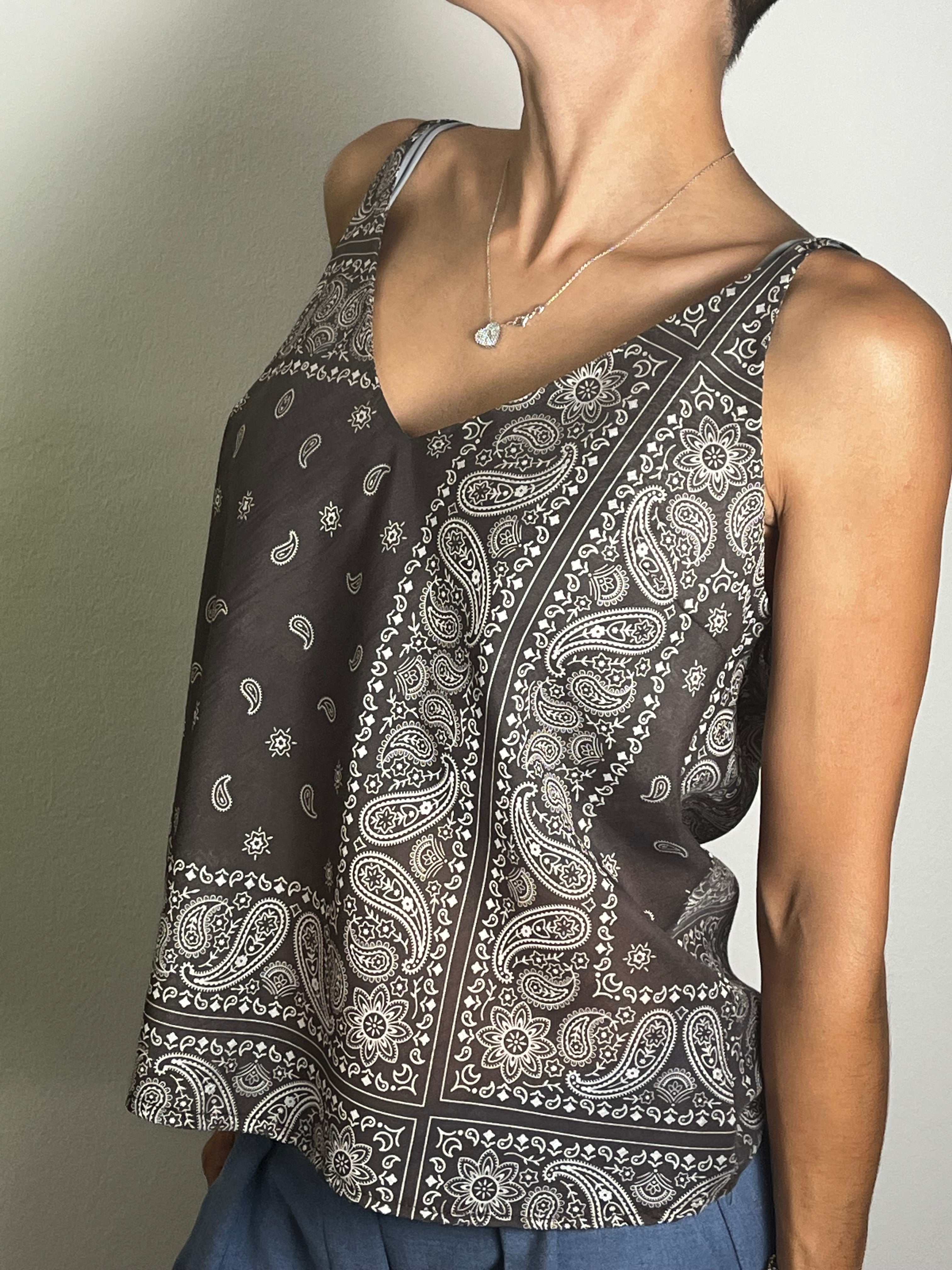 Woman wearing bandana Moro print top with thin straps and regular fit
