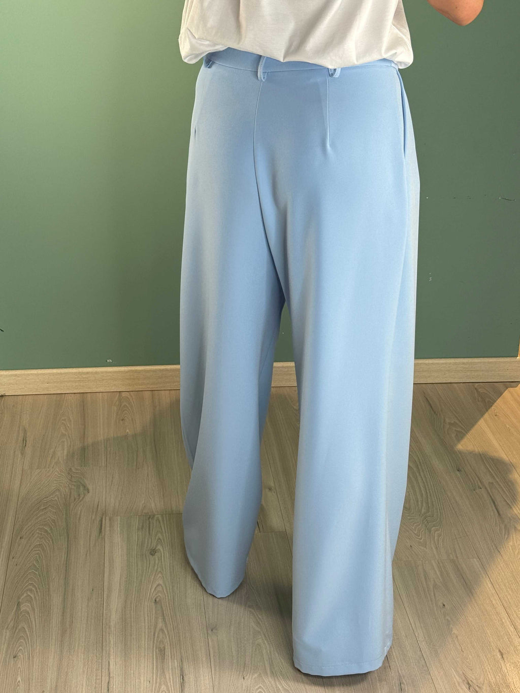 Light blue Pantalone Spring Saiph palazzo pants with regular fit worn by model indoors