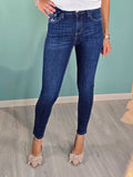 Women's denim skinny jeans in dark blue with regular fit and stretch fabric.