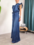 Dettaglio laterale del pantalone palazzo Susy Mix in chambray blu con vita elasticizzata